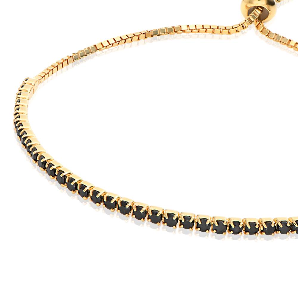 Pulsera de Tenis Ajustable Holly con con Zirconia Cúbica Negra en Baño de Oro-2 Pulsera de Tenis Ajustable Holly con con Zirconia Cúbica Negra en Baño de Oro-2 foto de producto