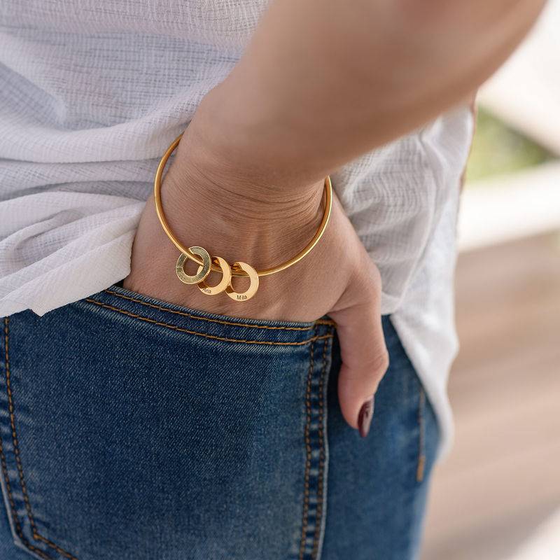 Pulsera Rígida con Colgantes Redondos en Baño de Oro-5 Pulsera Rígida con Colgantes Redondos en Baño de Oro-5 foto de producto