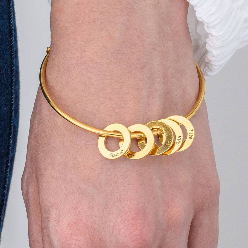 Pulsera Rígida con Colgantes Redondos en Baño de Oro-4 Pulsera Rígida con Colgantes Redondos en Baño de Oro-4 foto de producto