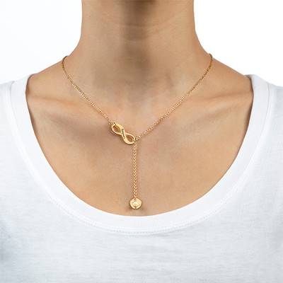 Collar Infinito y con Piedra de Nacimiento e Inicial en Chapa de Oro-1 foto de producto