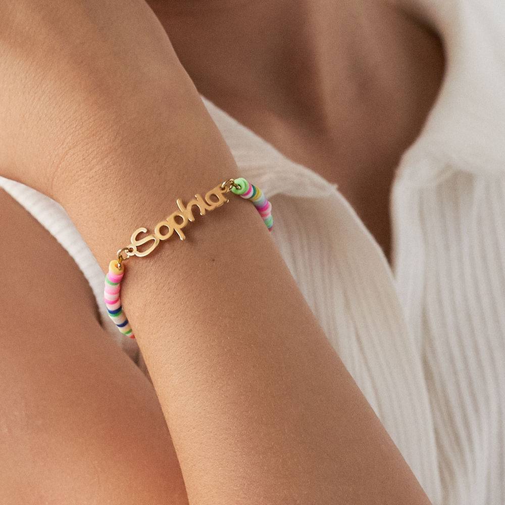 Pulsera con Nombre de Niña con Cuentas de Mágica Arcoíris en Baño de Oro-3 Pulsera con Nombre de Niña con Cuentas de Mágica Arcoíris en Baño de Oro-3 foto de producto